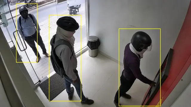 Face covered at the ATM on a CCTV camera