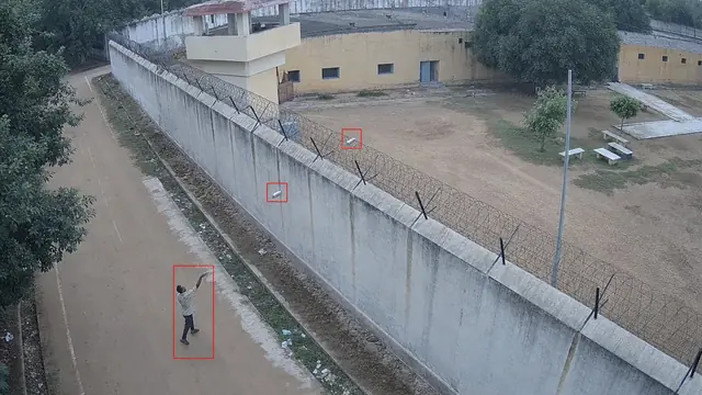 Items thrown over the wall on a CCTV camera