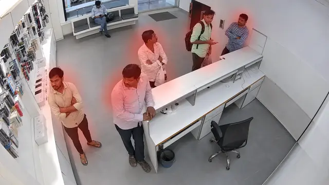 Customer waiting with no staff on a CCTV camera